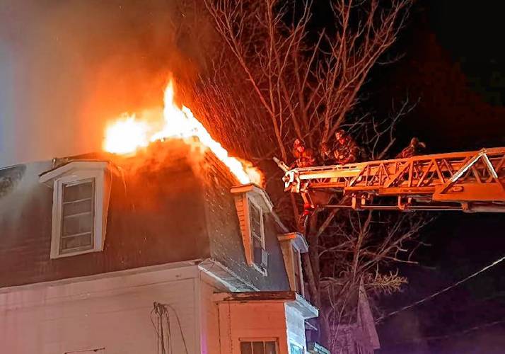 Crews from 11 fire departments worked to bring a three-alarm house fire at 21 Park St. under control on Wednesday morning. No one was injured, and all five residents of the single-family home have been displaced.