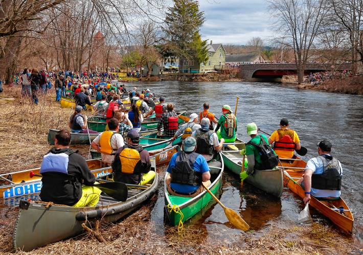 Competitors in the 55th annual River Rat Race line up at the starting position along the Millers River in Athol on Saturday, April, 14, 2018.