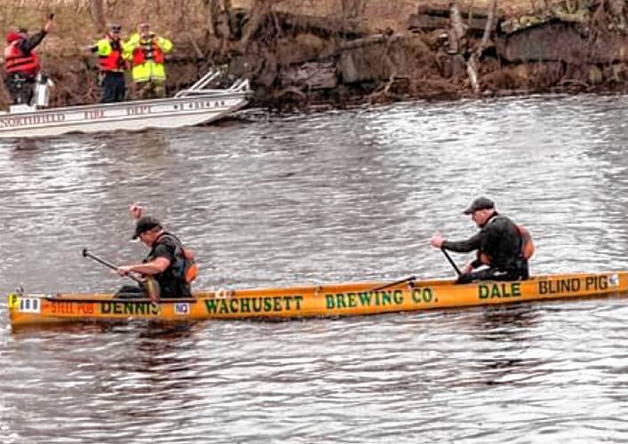 Dennis Carey (in front) paddles in the River Rat Race with Dale Persons, his teammate for many years. Carey will participate in this year’s race, his 40th to date. 