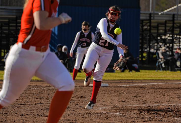 Frontier pitcher Raine Wonsey (21) makes a throw to first base against Agawam during the Redhawks’ season opener on Friday at Zabek Field in South Deerfield.