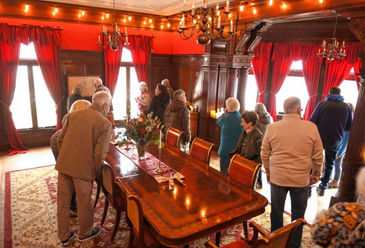 People tour the Revival Wheeler Mansion in Orange after a ribbon-cutting ceremony which marked the opening of the bed and breakfast.