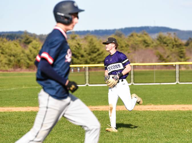 Smith Academy shortstop Cam Graves (13) hauls in a pop up for an out against Mahar during the host Senators’ 13-6 victory on Monday in Orange.