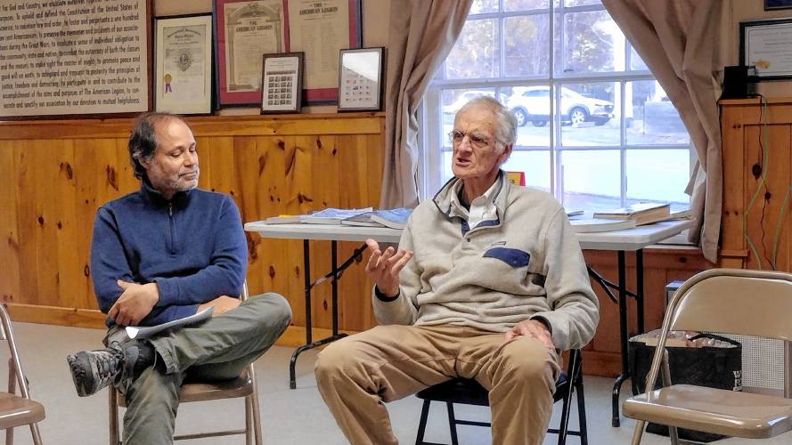 Local farmer Andre Pierre (left) and University of the Wild founder Larry Buell met with some Petersham residents Sunday to discuss the future of the 228-acre Rice's Roots Farm.