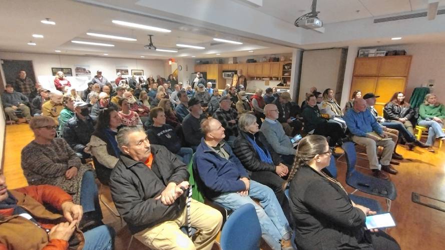 Residents packed the community room at the Athol Public Library for a meeting on three possible reuse options for the 100-acre Bidwell property on Tuesday, Jan. 30.