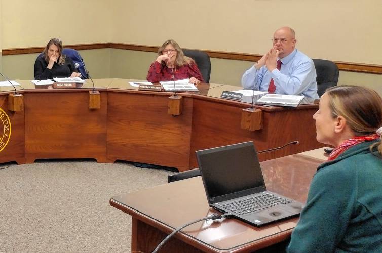 BSC Group Director of Planning Heather Gould (far right) met with the Selectboard to review the site planning process for the town-owned Bidwell property and results of a community survey for the land’s future. 