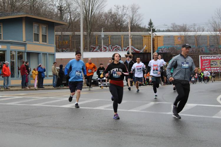 Runners braved the rain for the Big Cheese 5K in 2022 as part of the River Rat Race festivities.