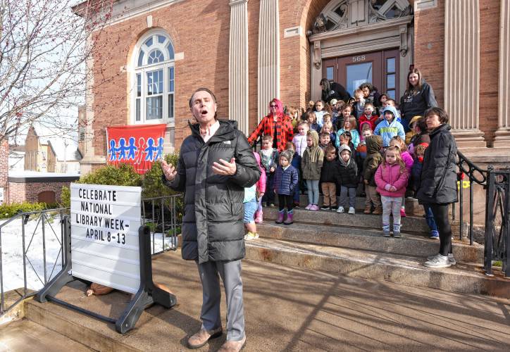 Jeff Trant of the Children’s Advocacy Center of Franklin County and the North Quabbin Area speaks in front of the Athol Public Library during a flag-raising ceremony for Child Abuse Prevention Month on Friday morning.
