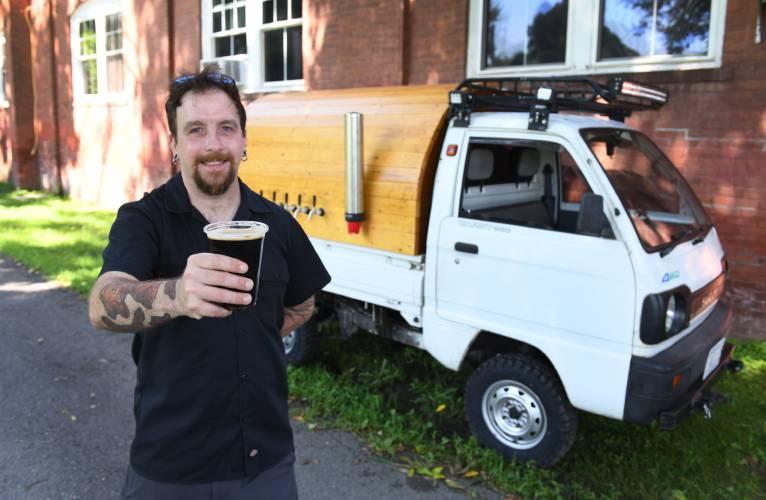 Montague resident Chad Champoux transformed his 1990 Suzuki Carry into a brewery on wheels called the “KEIgerator.” For Champoux, the decision by the Registry of Motor Vehicles to resume registrations of Kei vehicles takes away the stress of fearing he might be told that the registration for his 1990 Suzuki Carry was no longer valid.