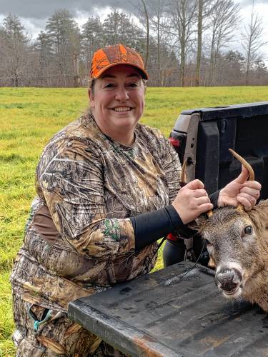 Stacy Clark with her first deer.