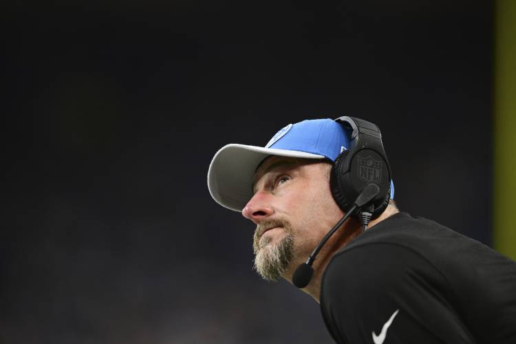 Detroit Lions head coach Dan Campbell looks towards the scoreboard during the first half of an NFL football game against the Green Bay Packers, Thursday, Nov. 23, 2023, in Detroit. (AP Photo/David Dermer)