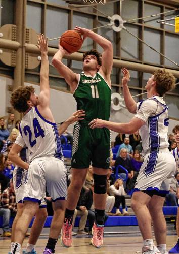 Greenfield’s Jon Breor (11) pulls up for a shot against Wahconah during the Green Wave’s 62-47 loss on Saturday night in Dalton.