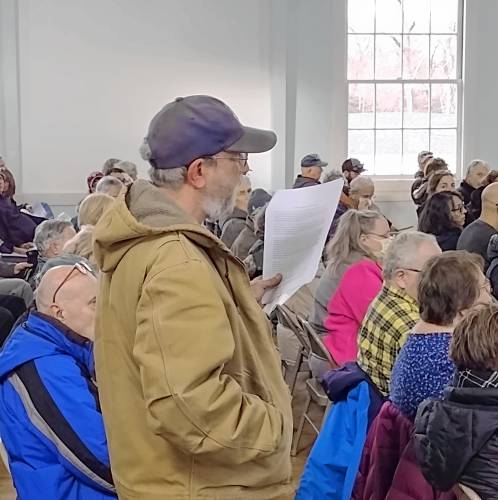 Petersham resident Josh Chernin poses a question at Saturday's Special Town Meeting.