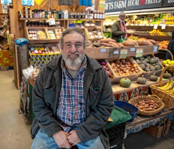 Jeremy Barker-Plotkin, co-owner of Simple Gifts farm in Amherst, in the farm store.