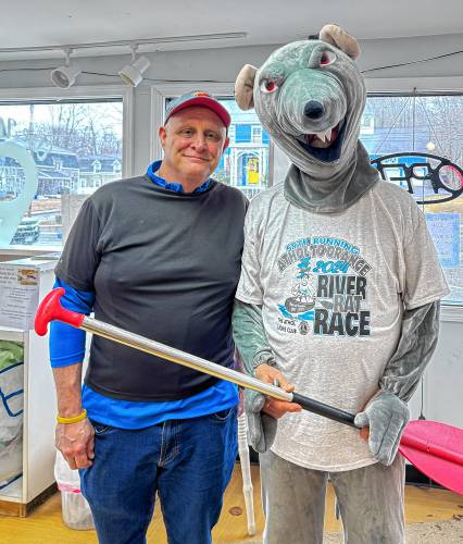 Lunenburg resident Jay McHugh with Athol Lions River Rat Race mascot “Paddles” in Else Where in Athol, where Jay came to register for the River Rat Race and pick out an official River Rat Shirt for himself and his 29-year old son, Zach, who will team up in next month's 59th year of the Athol to Orange race on the Millers River. Jay once paddled in the River Rat Race for 18 years in a row, and estimates he has done more than 20 Athol Lions River Rat Races. The River Rat Race is on Saturday, April 13, at 1 p.m. Signups can be done online at www.RiverRatRace.com or in person at Else Where at 1485 Main St. in Athol. Entries close on Thursday, April 11, at 8 p.m. 