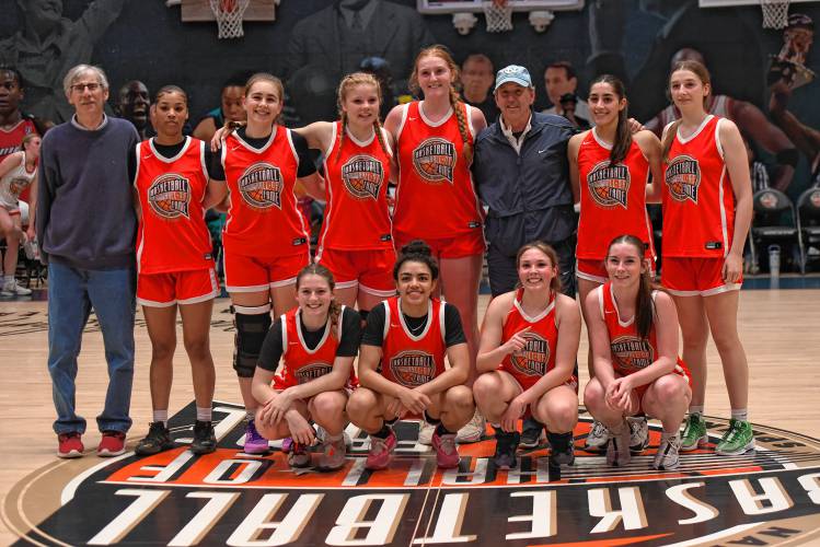 Team Red poses for a picture at Center Court following the Naismith Memorial Basketball Hall of Fame Western Mass. Girls Senior All-Star Game on Thursday night in Springfield.