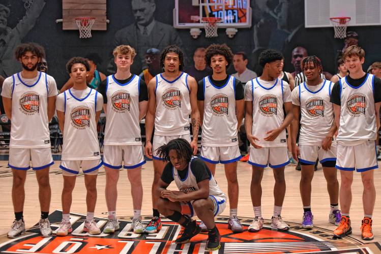 Team White poses for a picutre at Center Court following the Naismith Memorial Basketball Hall of Fame Western Mass. Class A and B Senior All-Star Game on Thursday night in Springfield.