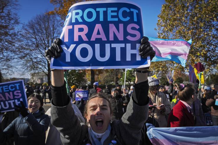 Supporters of transgender rights rally at the Supreme Court last December in Washington. 