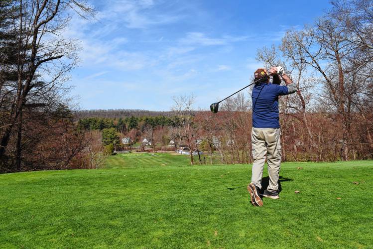 Teeing off on the first hole at Thomas Memorial Golf Course and Country Club in Turners Falls.