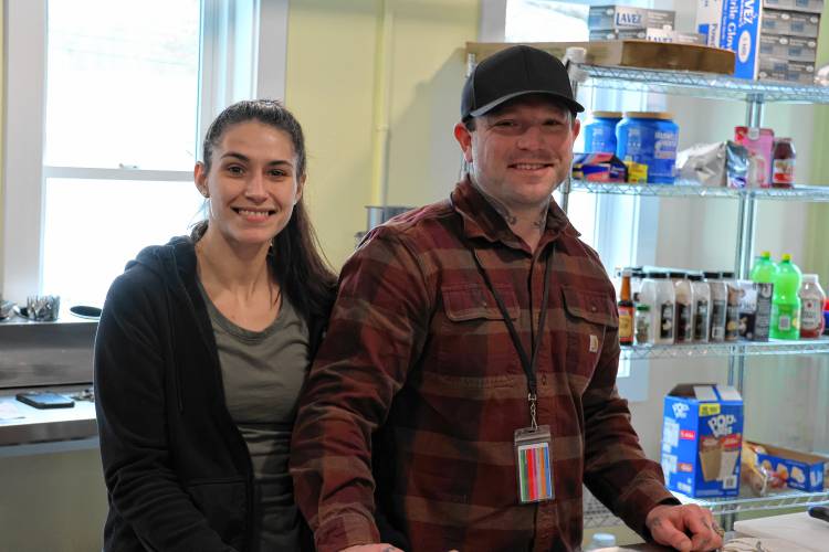 (From left) Sabrina Silva and James Winget work on meals at Sunrise Ridge. The new facility run by GAAMHA opened in late February and works with women battling substance abuse and mental health disorders.