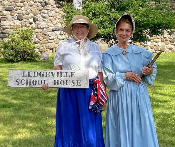 Barbara Hanno (left) and Barbara Metzger portray school teachers as part of the Petersham Historical Society contingent at the last Fourth of July parade. The upcoming Oct. 26 event at the historical society building will have exhibits on education in the days of one-room schoolhouses.