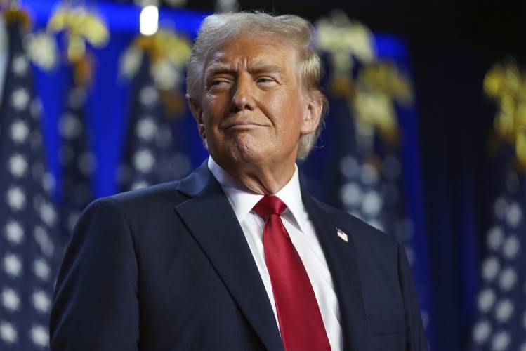 Republican presidential nominee former President Donald Trump arrives at an election night watch party at the Palm Beach Convention Center, Wednesday, Nov. 6, 2024, in West Palm Beach, Fla. Republican presidential nominee former President Donald Trump arrives at an election night watch party at the Palm Beach Convention Center, Wednesday, Nov. 6, 2024, in West Palm Beach, Fla.