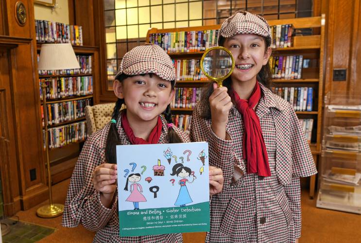 Belley Barrett, 8, and her sister, Emma Barrett, 11, both of Orange, have written a mystery book, “Sister Detectives.” They will read from their book at an event at Wheeler Memorial Library at noon on Saturday.
