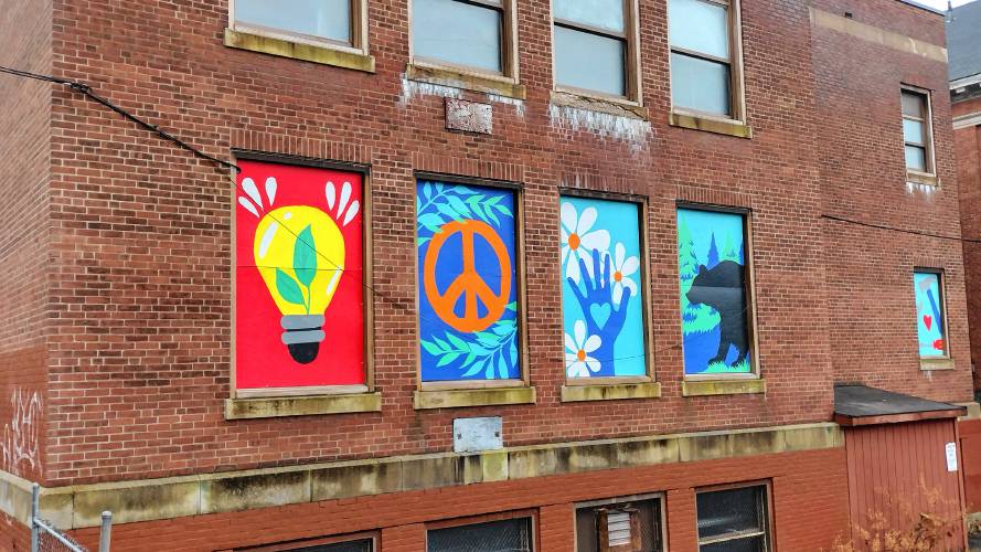 Panels painted by nine Athol students now adorn the former Riverbend School, which will be redeveloped into mixed-income housing in the years ahead. The students were recognized for this contribution in a ceremony held last Saturday.