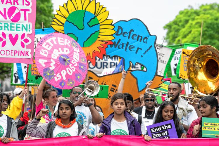 Student activists from Fridays for the Future join Earth Day rally and march to the White House on Saturday, April 22, 2023 in Washington.