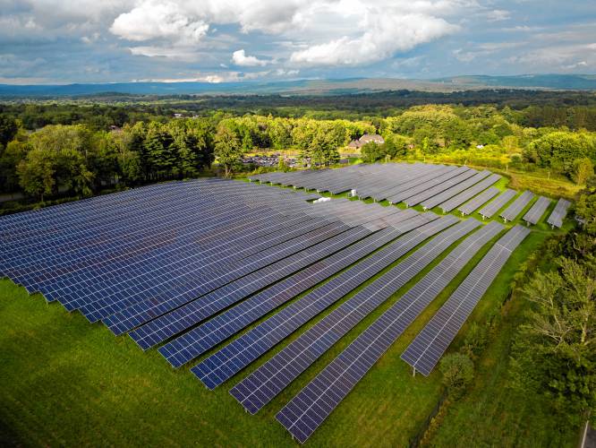 A field of solar panels along West Bay Road in Amherst. Cinda Jones, president of W,D, Cowls said at the forum that spot projects like this one placed amid the region’s forested areas are a sound way to site solar.