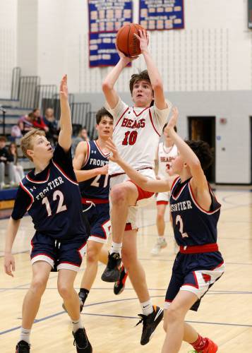 Athol’s Ben Kearney (10) puts up a shot against Frontier in the second quarter Thursday at Goodnow Gymnasium in South Deerfield.