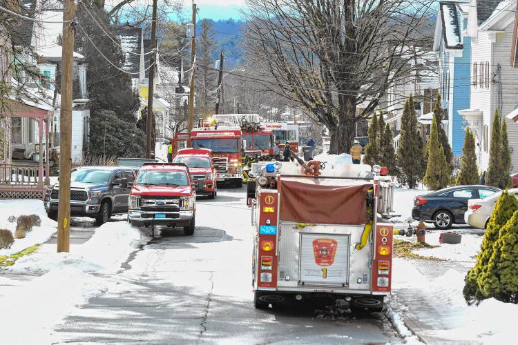 Fire trucks line Mechanic Street in Orange, scene of a two alarm fire that displaced a family. 