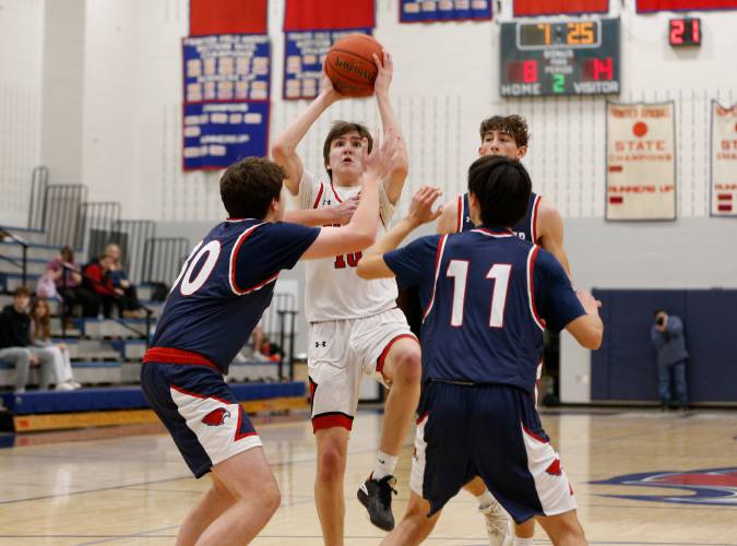Athol’s Ben Kearney (10) puts up a shot against Frontier in the first quarter Thursday at Goodnow Gymnasium in South Deerfield.