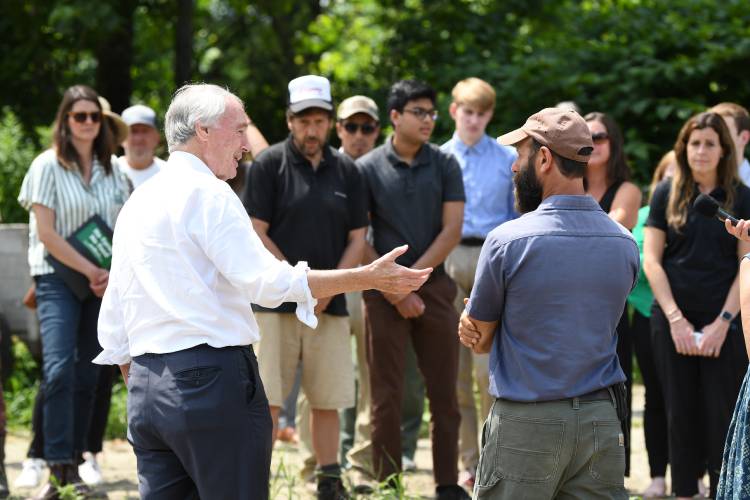U.S. Sen. Ed Markey talks with David Fisher of Natural Roots farm in Conway about his flood-damaged fields in early August. Natural Roots was recently awarded $10,000 through the Farm Resiliency Fund.
