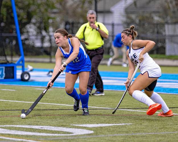 Racquel Provost dribbles the ball for the Assumption field hockey team against Pace earlier this season. Provost, who attended Greenfield High School and Northfield Mount Hermon, has started all but one game for the Hounds this fall.