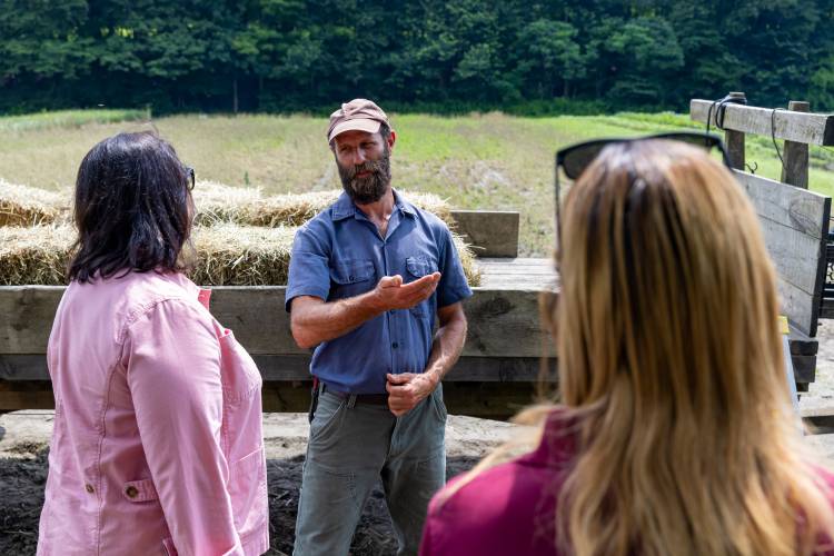 Natural Roots owner David Fisher speaks to Lt. Gov. Kim Driscoll and Massachusetts Department of Agricultural Resources Ashley Randle, as state officials assessed damage at the farm in mid-July. Natural Roots was recently awarded $10,000 through the Farm Resiliency Fund.