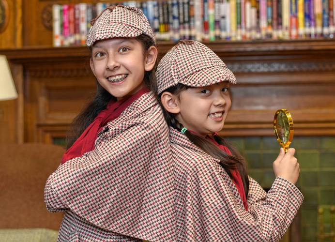 Emma Barrett, 11, and sister Belley Barrett, 8, of Orange, have written a mystery novel, “Sister Detectives.” They will read from their book at an event at Wheeler Memorial Library at noon on Saturday.