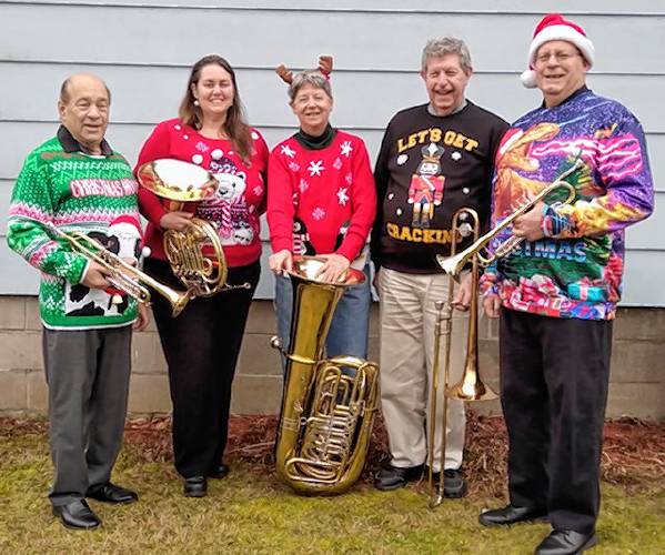 Pioneer Valley Brass will be performing four holiday concerts sponsored by the First Universalist Parish of North Dana. From left: Steve Babineau, trumpet; Tabitha Greenlees, horn; Susan Lemei, tuba; Dana Tandy, trombone; and Dick Tandy, trumpet.