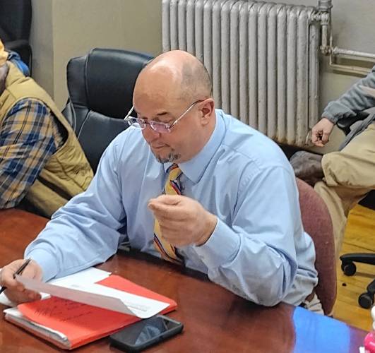 Athol Town Manager Shaun Suhoski speaks before the Fire Department Staffing Advisory Committee, explaining the cost of hiring eight additional firefighters at Wednesday’s meeting.