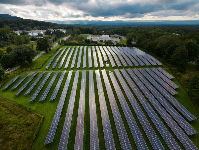 A field of solar panels along West Bay Road in Amherst. A recent report found 2023 was one of the worst years for solar development in Massachusetts in the last decade.