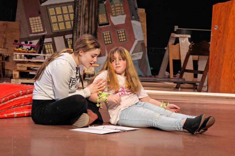 Bronwyn Whitney (left) and Chevonne Stockwood rehearse a scene for the Athol Theatre Department’s production of “Peter Pan,” which opens on Friday, April 5.