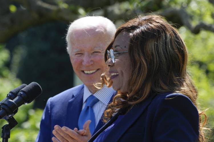Catherine Coleman Flowers, shown here with President Joe Biden in April 2023,  was the keynote speaker for Black History Month at UMass on Thursday night.  