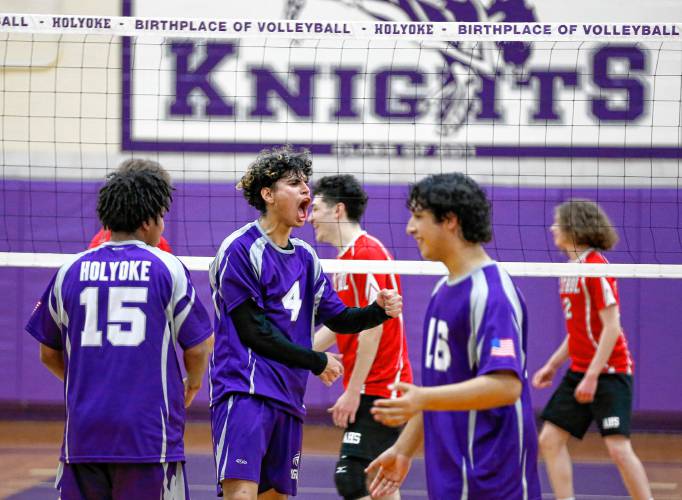 Holyoke’s Adrian Centeno-Feliciano (4) celebrates after registering a kill against Athol in the second set Friday in Holyoke.